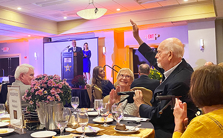 Photo of Former BW President Neal Malicky (right) being acknowledged for his contributions during the ceremony.